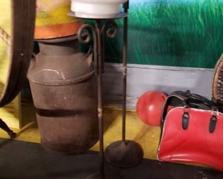 (2) Metal tall floor large candle holders (1) 35"H (1) 28.5"H 