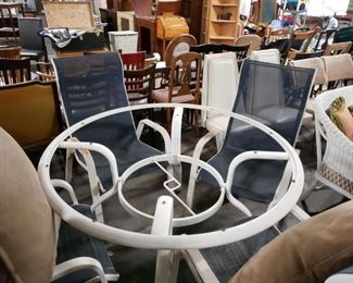 5 pc Aluminum & steel patio set. 4 chairs with navy blue woven fabric. 4 foot table no glass 