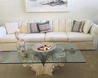 4 cushion 10 ft. Couch,  $250 excellent condition, palm base cocktail table with rectangle glass top $150