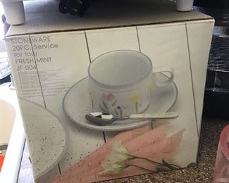 Set of Dishes with Matching Flatwear