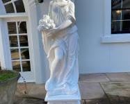 Many Cement Garden Statues