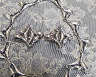 Beautiful sterling silver choker necklace and earrings.  Signed.