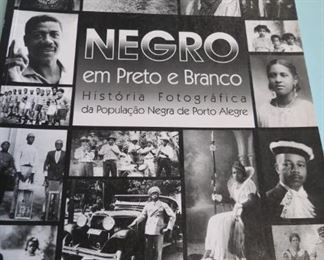 Portuguese.  Negro in black and white.  "Signed copy".