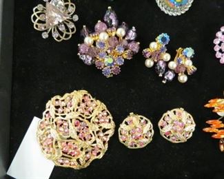Beautiful vintage brooches with matching earrings.