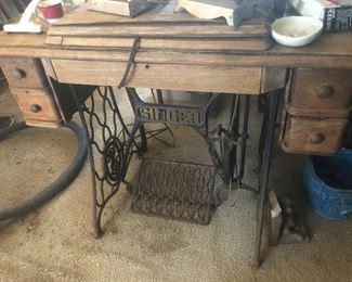 Cool steel bottom singer sewing machine cabinet