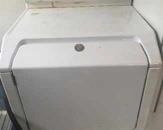 Dryer with wonky eyes and a big frown