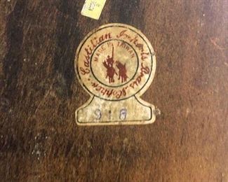 It says, "Pelican Gurkin Brandy Sphincter."