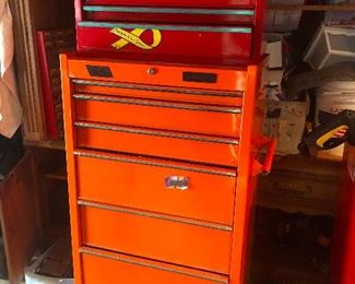 red tool chest good for storing things other than tools, like tiny taxidermied frogs playing trumpets and such