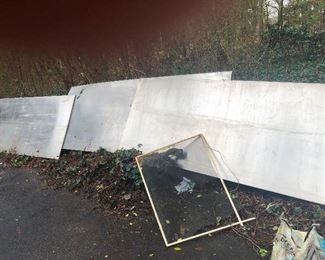 These are large panels of stainless steel used as backsplash for an industrial kitchen. SO MANY potential uses! Like maybe AUTOPSY tables! Opening a morgue? You need this! I would think of other examples but I'm addicted to Forensic Files and this is the best you'll get outta me.