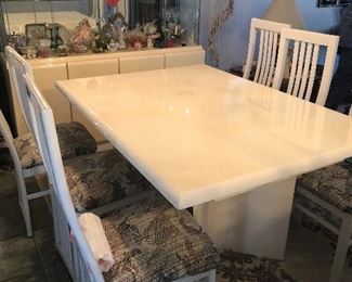 White lacquer table and six chairs150.0
Table size 36 x 60 plus a 18 inch  leaf 
