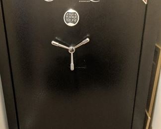Canon Safe. It is very large, you will need too bring help moving it. The door comes off.