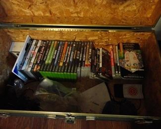 Boxes and boxes of video games/ DVD's/VHS movies