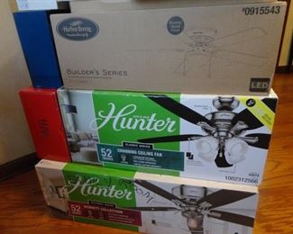3 assorted ceiling fans ( new in the box)