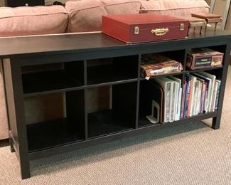 Lot #238 - $60 - Ebony Console Table with Shelves / Cubbies