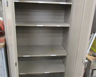 Metal cabinet with shelves 25.00