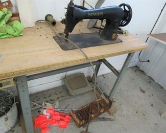 Singer commercial grade Sewing machine with Lion clutch single phase condenser motor plus table Price 100.00 obo