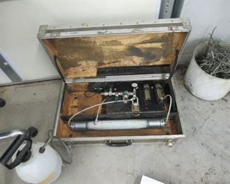 Don't know what this is in the case, tell me and will give you a price!                                                                                            Sprayer Price $3.00                                                               
Bucket of pegboard hangers Price$ 4.00