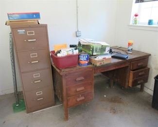 Filing cabinet 4 drawer Price $10.00 obo                                      Wood desk Price$10.00 obo