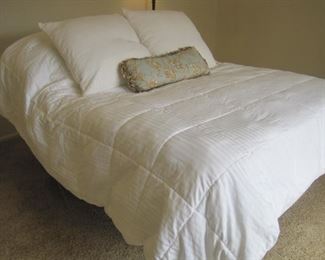 Temperpedic electric adjustable massaging queen size bed.