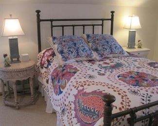 Queen bed with Anthropologie  bedding.