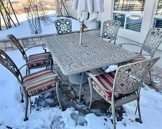 Sand Colored Wrought Iron Patio Table & Chairs. https://ctbids.com/#!/description/share/352492