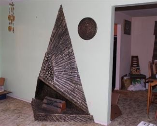 Fireplace by Adrian Pearsall for Craft Associates, USA, 1970s. The triangular base with triangular hood all with textured bronze finish, circa 1970s. Measures: 87" high, 65" wide, 24.5" deep.
