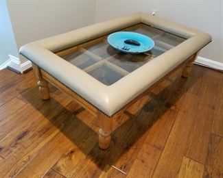 custom made coffee table, padded leather "railing" was added to the top (paid $525 extra for this)