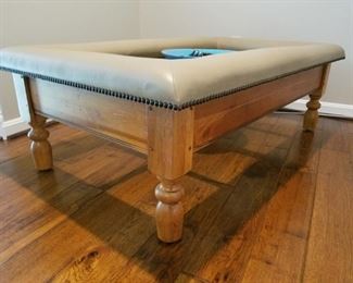 custom made coffee table, padded leather "railing" was added to the top (paid $525 extra for this)