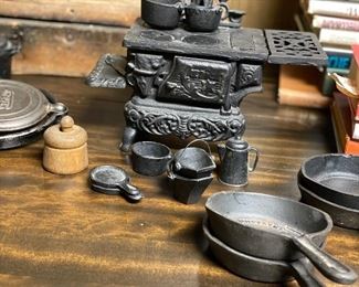 Advertising and toy cast iron pieces 