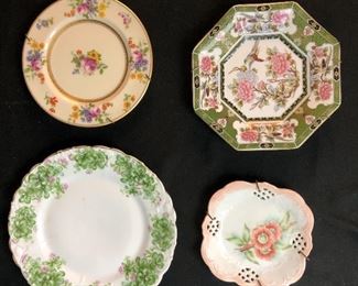 4 Porcelain plates.
