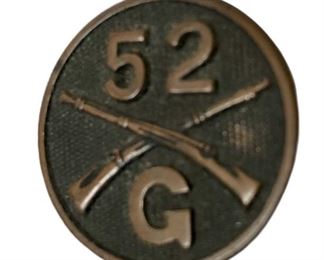 Antique Military Lapel Pin with crossed rifles.