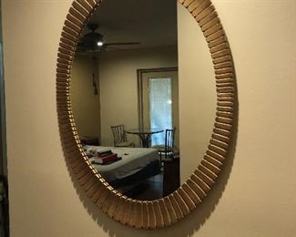 Large Oval wall mirror with gold tone frame