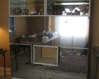 Mirrored wall unit $125