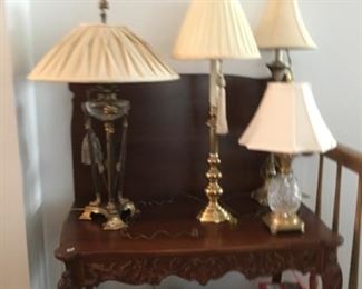 Nice  table,   table has 3 leaves or game table,  lamps, small pineapple crystal front right is signed OLD Waterford with seahorse engraved. 