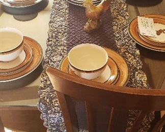 Table w/6 chairs,  dinnerware w/moose pattern