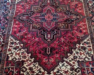 Vintage, hand-woven Persian Heriz rug, 100% wool face, measures 7' x 10'.