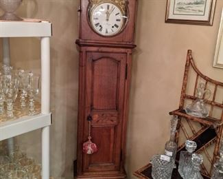 Antique French pecan wood tall clock.