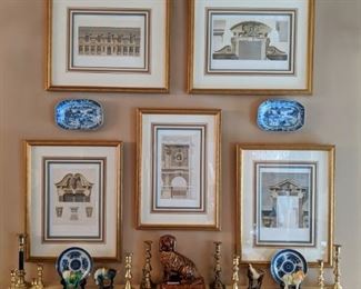 Set/5 well-framed architectural prints, collection of brass candlesticks, Asian blue/white porcelain plates and single, but ready to mingle, English earthenware Staffordshire spaniel. 