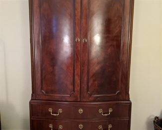Baker "Historic Charleston Reproductions" 9-drawer mahogany armoire.