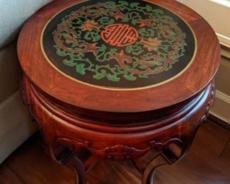 One of a pair of Asian rosewood & cloisonne round side tables. 