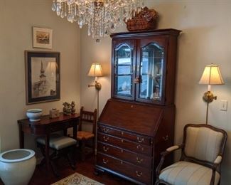Kittinger mahogany drop-front bookcase, with needlepoint rug.