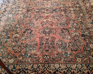 Antique hand-woven Persian Sarouk rug, 100% wool face, measures 9' 4" x 12' 6"; softly muted colors and in excellent condition commensurate with age. 