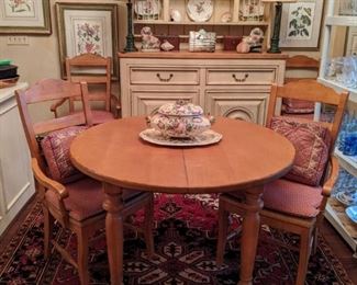 Drexel Country French pine breakfast room table, with two leaves and four matching armchairs.