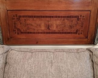 Detail of the inlaid walnut French wall mirror.