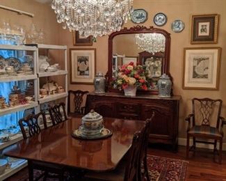 Baker "Historic Charleston Reproductions" banded mahogany dining table, with two leaves, four side chairs and pair of armchairs.  19th century hand-carved walnut mirror, pair of vintage Asian porcelain jars, vintage hand-woven Persian Heriz, measuring 7' x 10'.