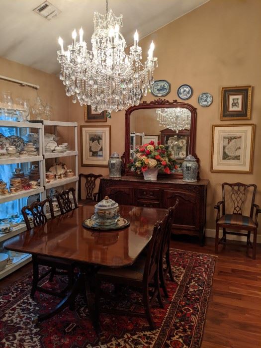 Baker "Historic Charleston Reproductions" banded mahogany dining table, with two leaves, four side chairs and pair of armchairs.  19th century hand-carved walnut mirror, pair of vintage Asian porcelain jars, vintage hand-woven Persian Heriz, measuring 7' x 10'.