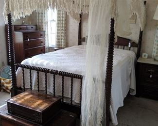 this wonderful bed goes back three generations the crochet top was done by one of the grandmothers.