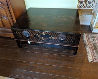 nice large oriental coffee tab le. has drawer and has separate base