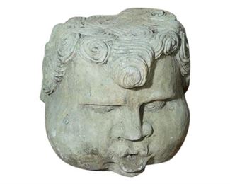 63. Carved Stone Head of a Child