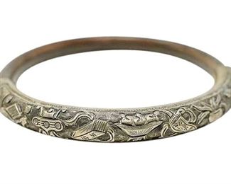 109. Antique Chinese Wood Silver Repousse Bangle